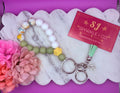 Floral teardrop wristlet