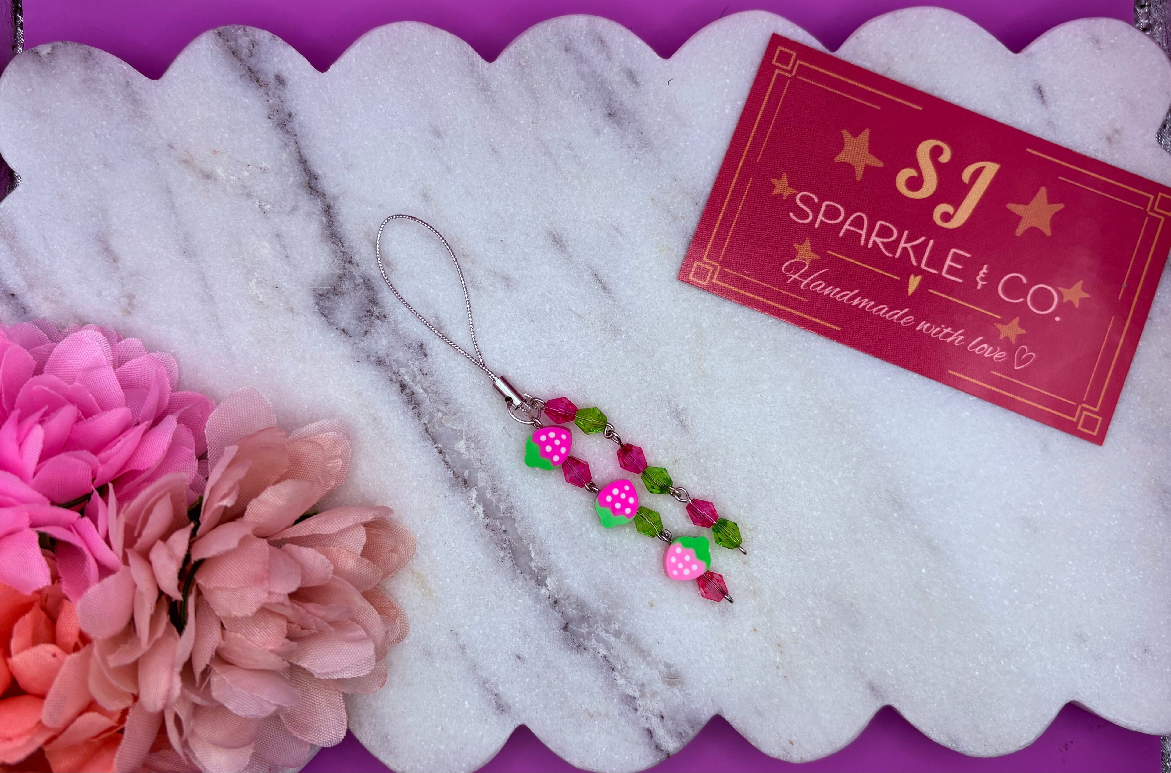 Strawberry pink crystal dangle phone charm